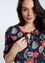 Rechte blouse met Indische bloemenprint en knoop